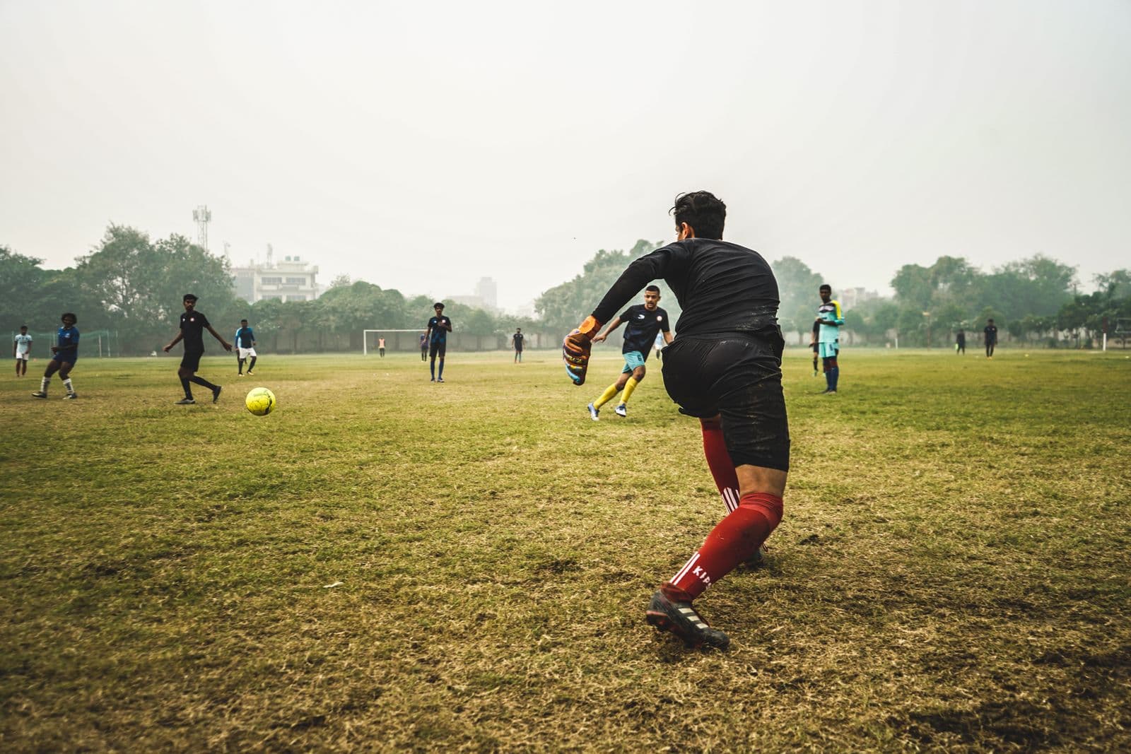 A local pitch on a hazy morning